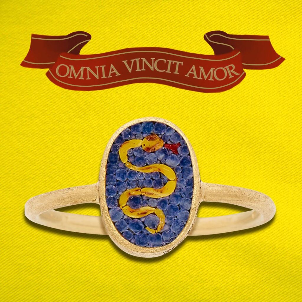 Serpente Ring top view on a yellow background with a red banner